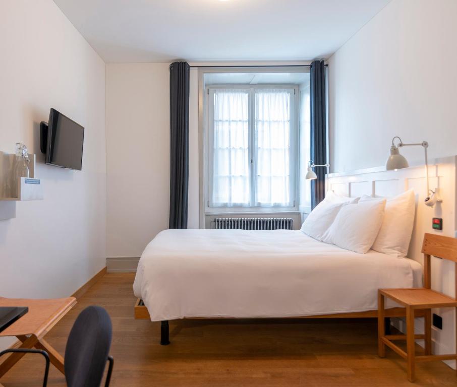 Двухместный (Небольшой двухместный номер с 1 кроватью) отеля Marktgasse Hotel, Цюрих