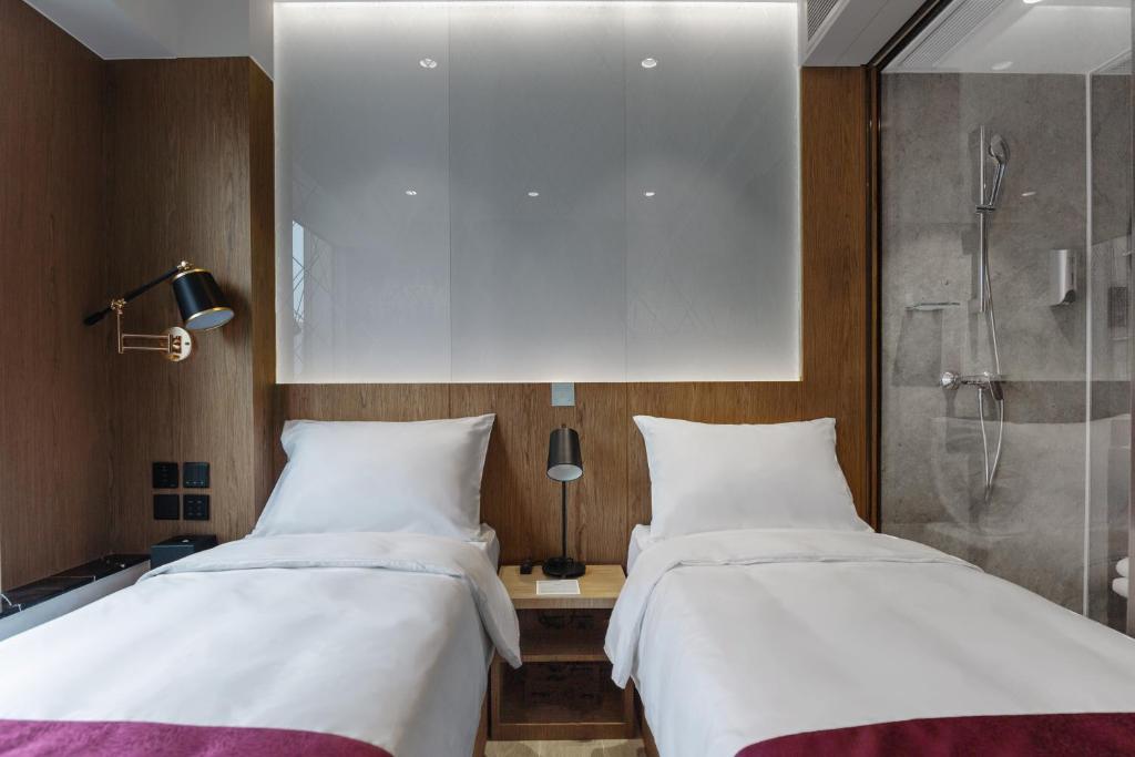Двухместный (Стандартный двухместный номер с 2 отдельными кроватями) отеля The OTTO Hotel, Гонконг (город)