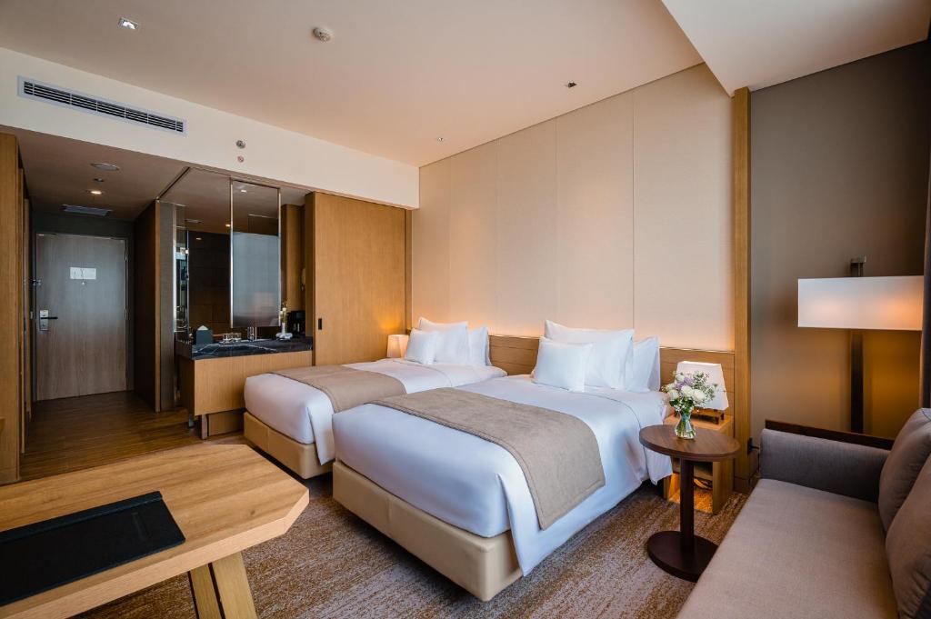Двухместный (Двухместный номер Делюкс с 2 отдельными кроватями) отеля Hotel Nikko Hai Phong, Хайфон
