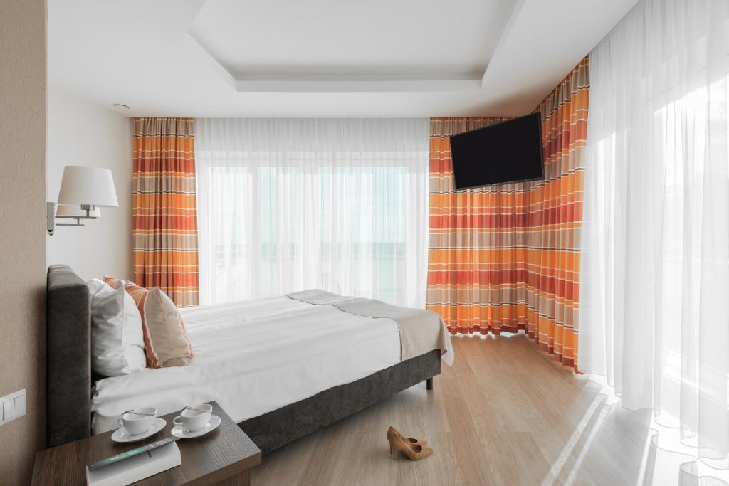Апартаменты (Premium Apartment with Terrace and City View (2 Adults)) апарт-отеля Green Loft Gdynia, Гдыня