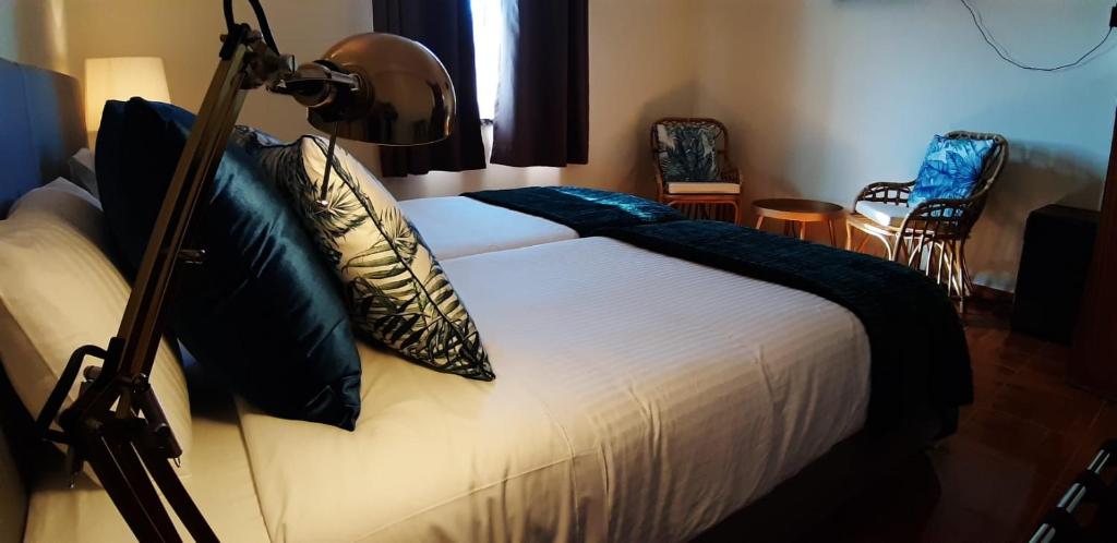 Двухместный (Двухместный номер с 2 отдельными кроватями) отеля Hotel Casa dos Arcos, Вила-Нова-де-Мильфонт