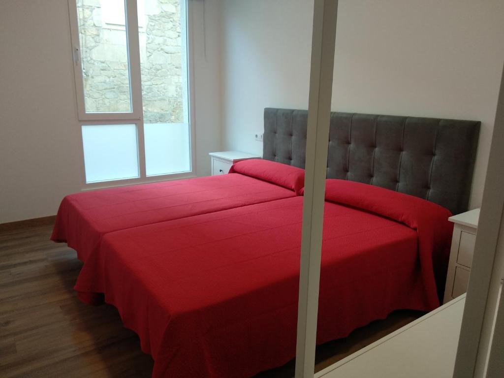Двухместный (Двухместный номер с 2 отдельными кроватями) хостела Albergue & Rooms Murgadán, Сантьяго-де-Компостела