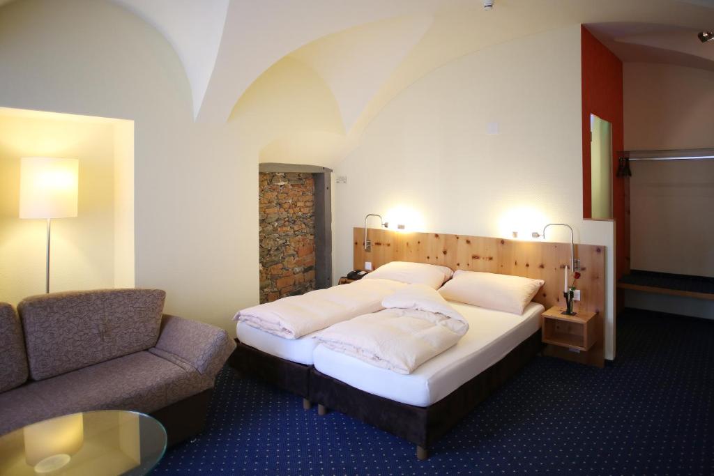 Двухместный (Улучшенный двухместный номер с 1 кроватью или 2 отдельными кроватями) отеля Ambiente Hotel Freieck, Кур (Граубюнден)