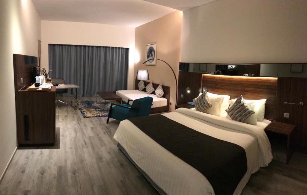 Студио (Номер-студио Делюкс с кроватью размера «king-size» - Пакет услуг Barracuda Dreamland) курортного отеля Barracuda Beach Resort, Умм-эль-Кайвайн