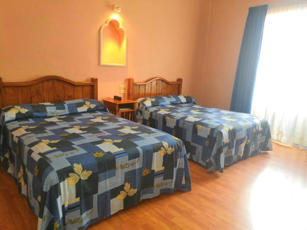 Двухместный (Двухместный номер с 2 отдельными кроватями) отеля Hotel De Talavera, Пуэбла
