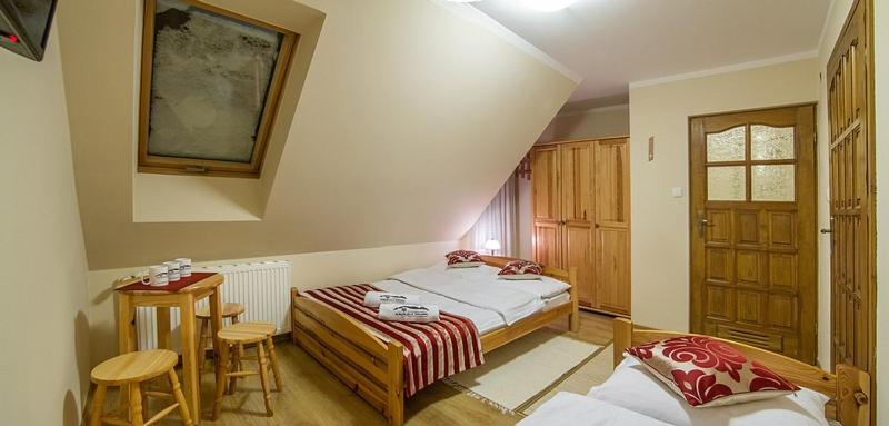 Двухместный (Небольшой двухместный номер с 2 отдельными кроватями) семейного отеля PokojePodTatrami, Бялы-Дунаец
