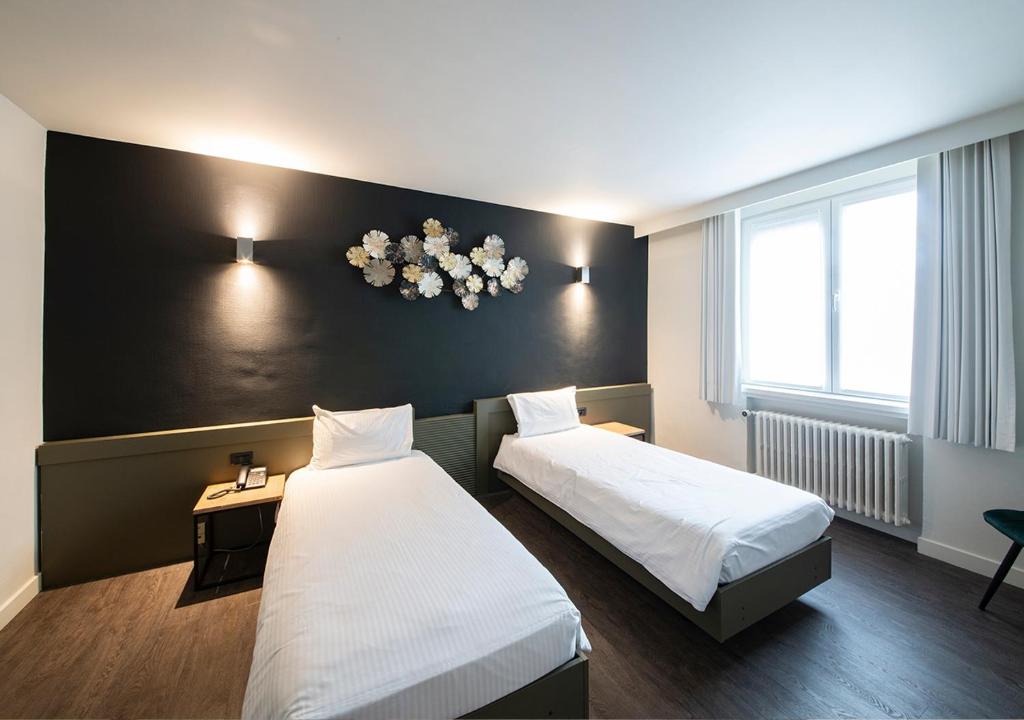 Двухместный (Стандартный двухместный номер с 2 отдельными кроватями) отеля Hotel Cortina, Кортрейк