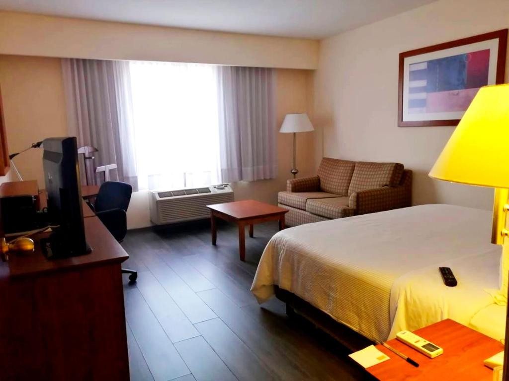 Двухместный (Двухместный номер с 2 двуспальными кроватями) отеля Fiesta Inn Celaya, Селайя