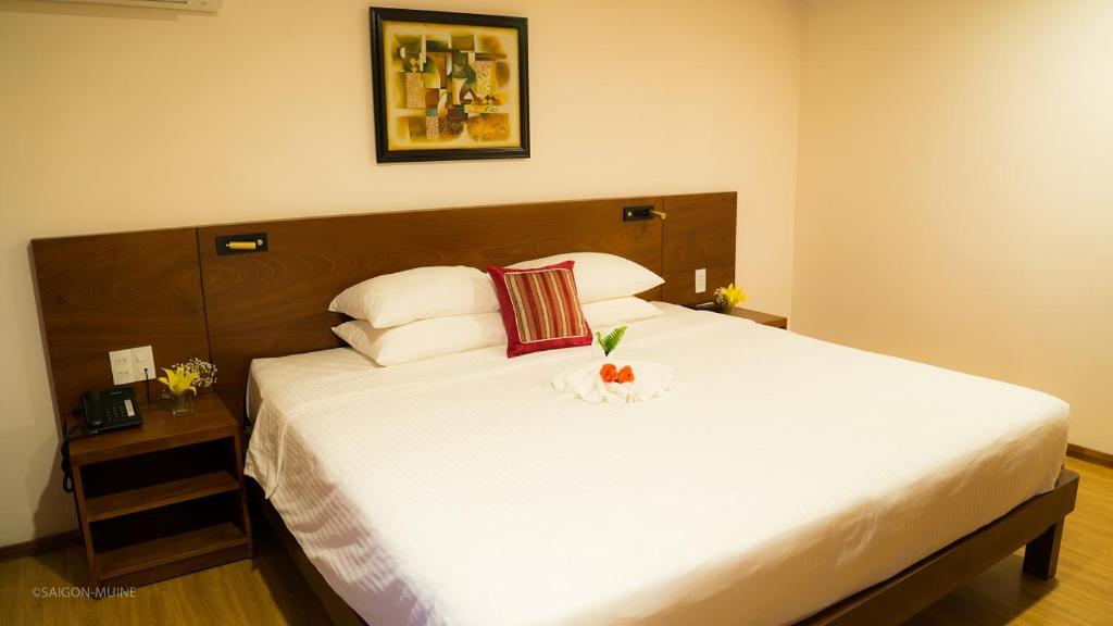 Двухместный (Улучшенный двухместный номер с 1 кроватью или 2 отдельными кроватями и видом на сад) курортного отеля Saigon Mui Ne Resort, Фантхьет