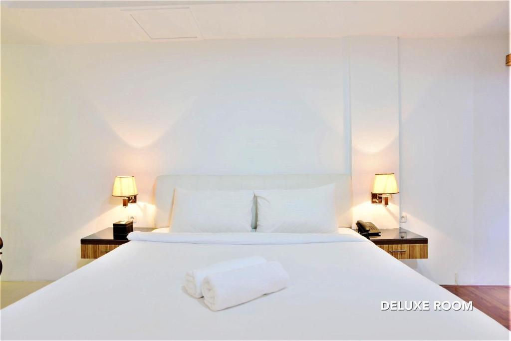 Двухместный (Двухместный номер Делюкс с 1 кроватью), ZEN Rooms Kasira Bintaro Sektor 7