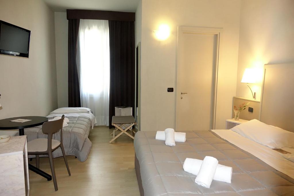 Трехместный (Трехместный номер) отеля Hotel Corallo Rimini, Римини