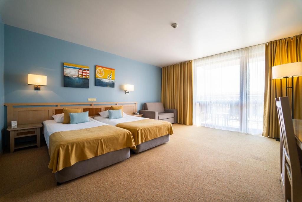Двухместный (Двухместный номер с 2 отдельными кроватями, боковой вид на море — Бесплатная парковка и доступ на пляж) курортного отеля HVD Club Hotel Miramar - Ultra All Inclusive, Обзор