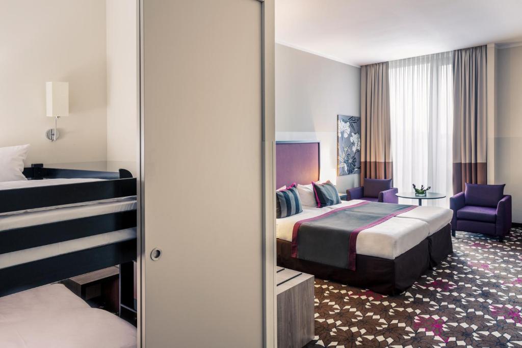 Трехместный (Двухместный номер с двуспальной кроватью и дополнительной кроватью) отеля Mercure Hotel MOA Berlin, Берлин