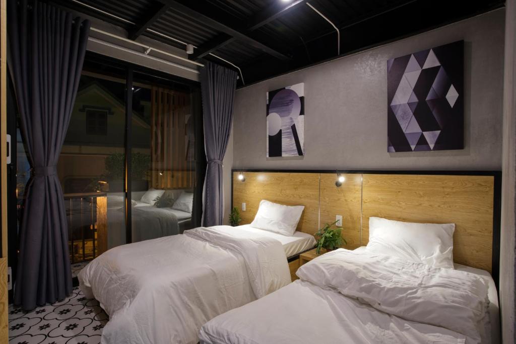 Двухместный (Двухместный номер с 2 отдельными кроватями и видом на город) отеля THE NEST QUANG BINH, Донгхой