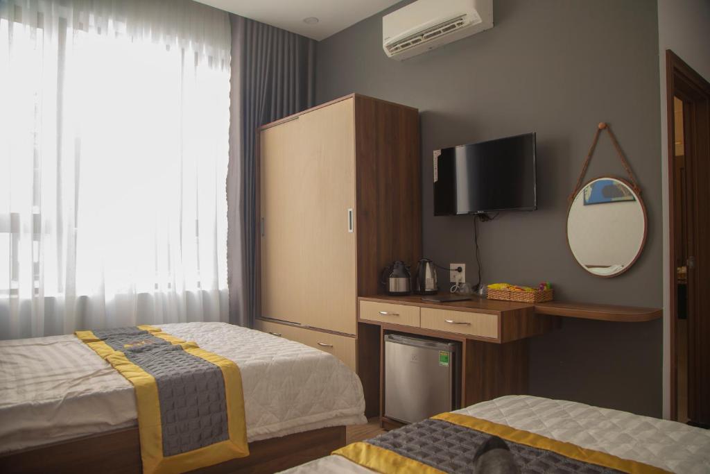 Двухместный (Большой двухместный номер с 1 кроватью) отеля Khách sạn Phú Yên - BaKa Hotel, Туихоа