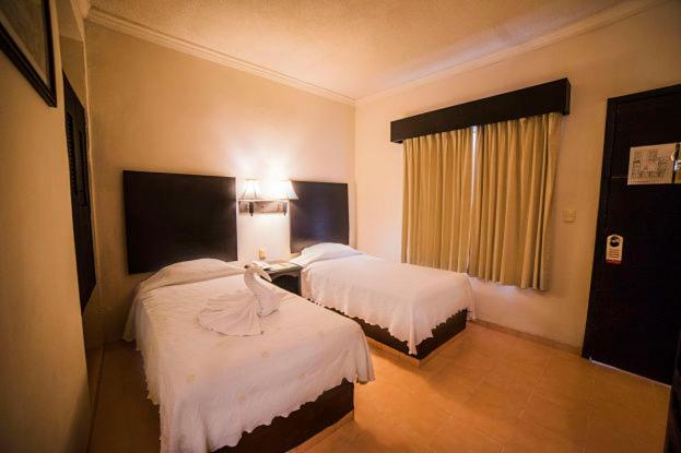 Двухместный (Небольшой двухместный номер с 1 кроватью) отеля Hotel Marlon, Четумаль