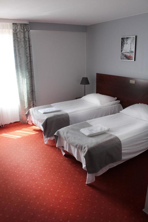 Двухместный (Стандартный двухместный номер с 2 отдельными кроватями) отеля Hotel Gordon, Варшава