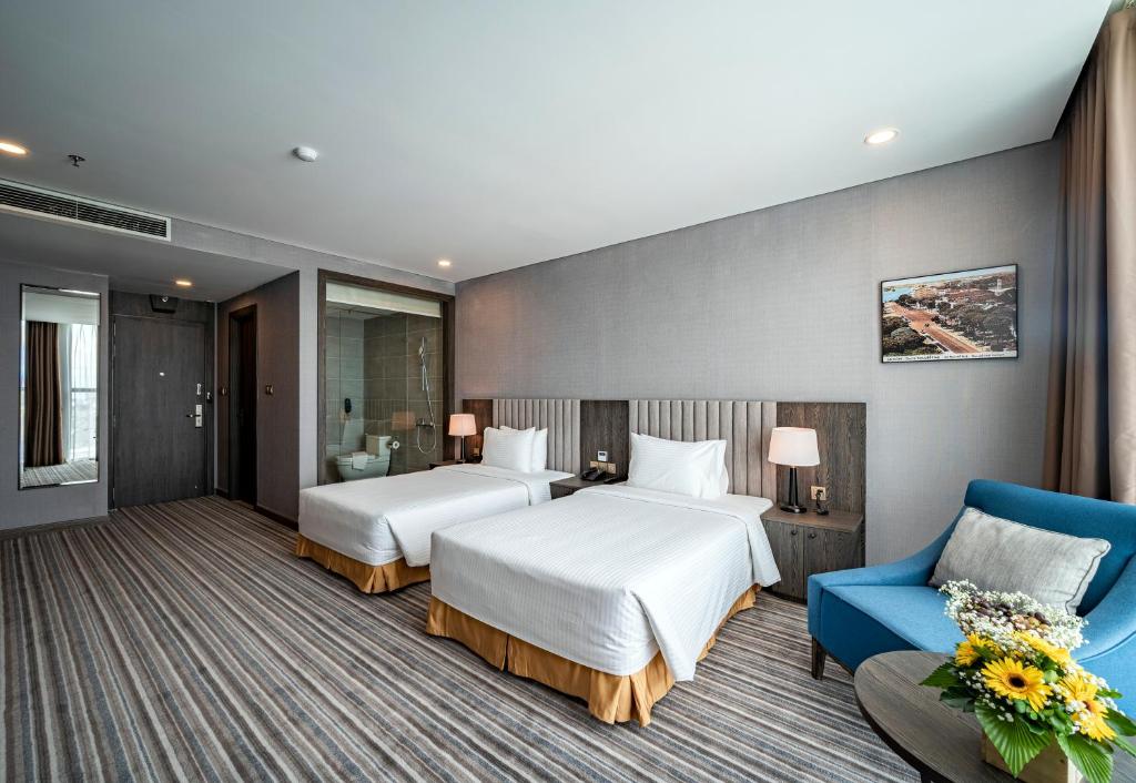 Двухместный (Двухместный номер Делюкс с 2 отдельными кроватями) отеля Muong Thanh Luxury Saigon Hotel, Хошимин
