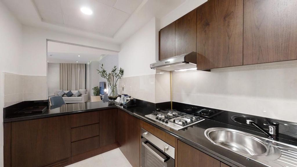 Апартаменты (Улучшенные апартаменты с 1 спальней) апарт-отеля Suha Park Hotel Apartment, Дубай