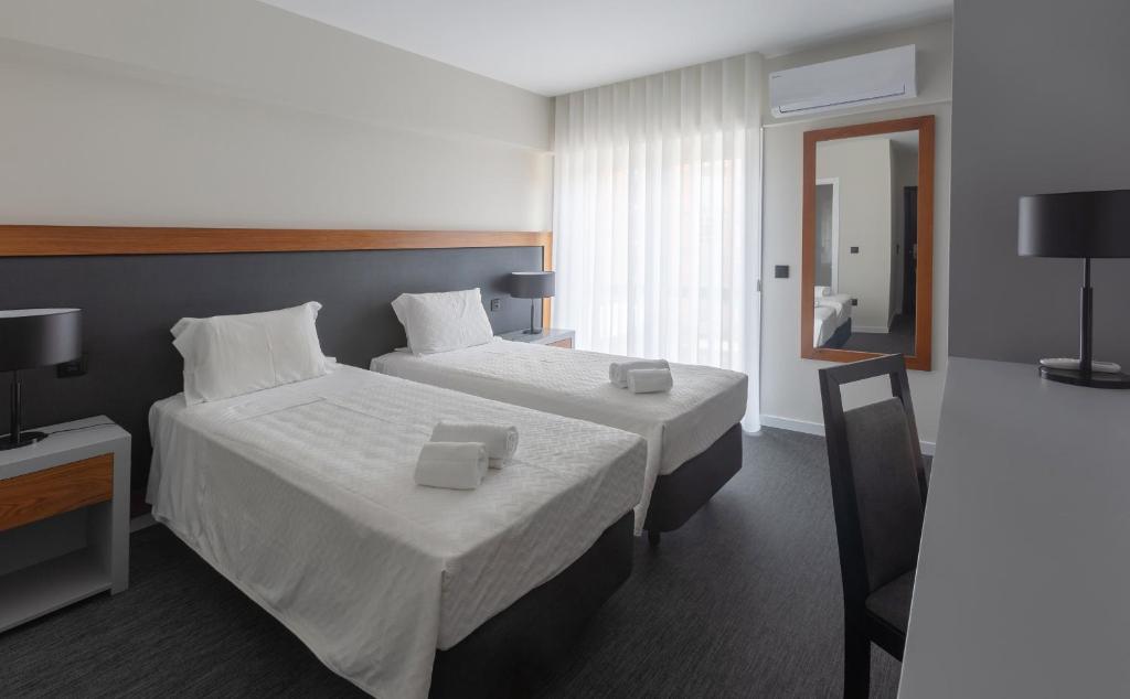 Двухместный (Двухместный номер с 1 кроватью или 2 отдельными кроватями - Подходит для гостей с ограниченными физическими возможностями) отеля Hotel Afonso V, Авейру
