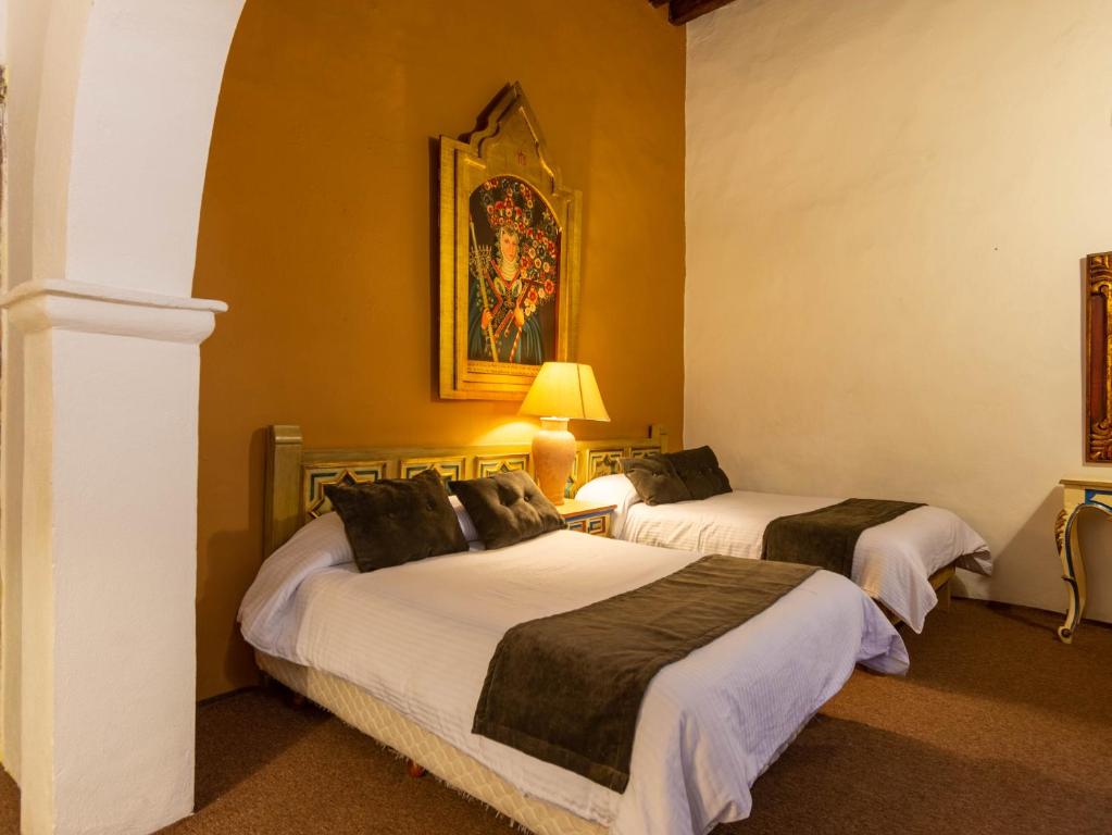 Двухместный (Двухместный номер с 2 двуспальными кроватями) отеля Hosteria del Frayle, Гуанахуато