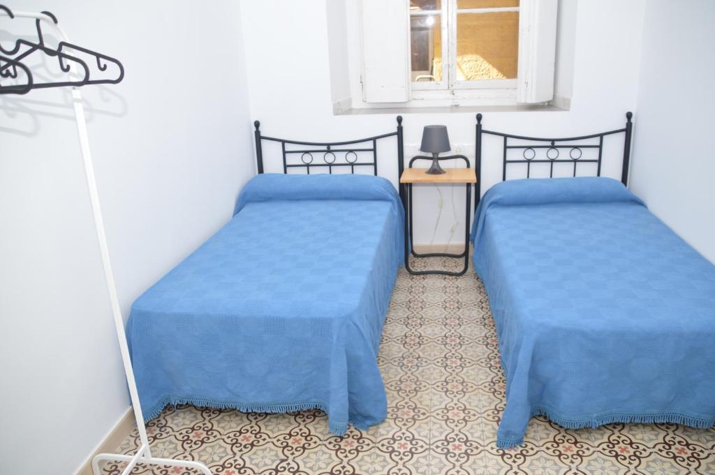 Двухместный (Двухместный номер с 2 отдельными кроватями и общей ванной комнатой) гостевого дома Pensión Las Cuatro Naciones, Кадис