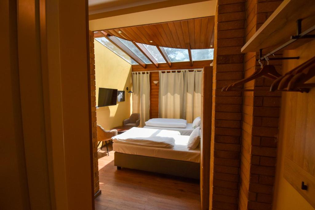 Двухместный (Двухместный номер Делюкс с 2 отдельными кроватями), Pension Sena