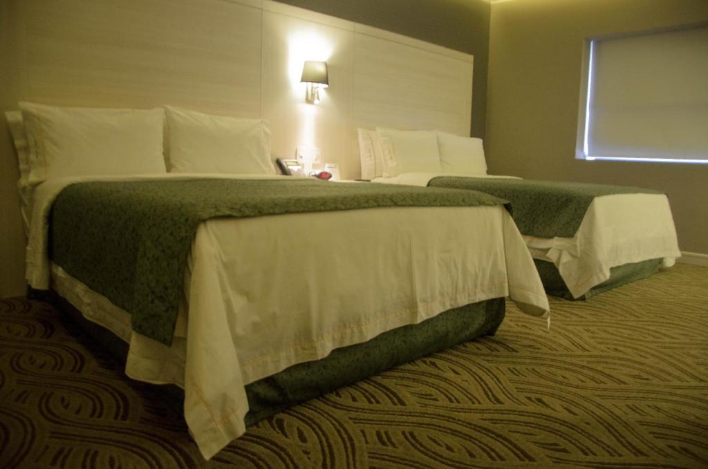 Двухместный (Номер с 2 кроватями размера «queen-size» и ванной - Подходит для гостей с ограниченной подвижностью - Для некурящих) отеля Holiday Inn Express Pachuca, Пачука-де-Сото