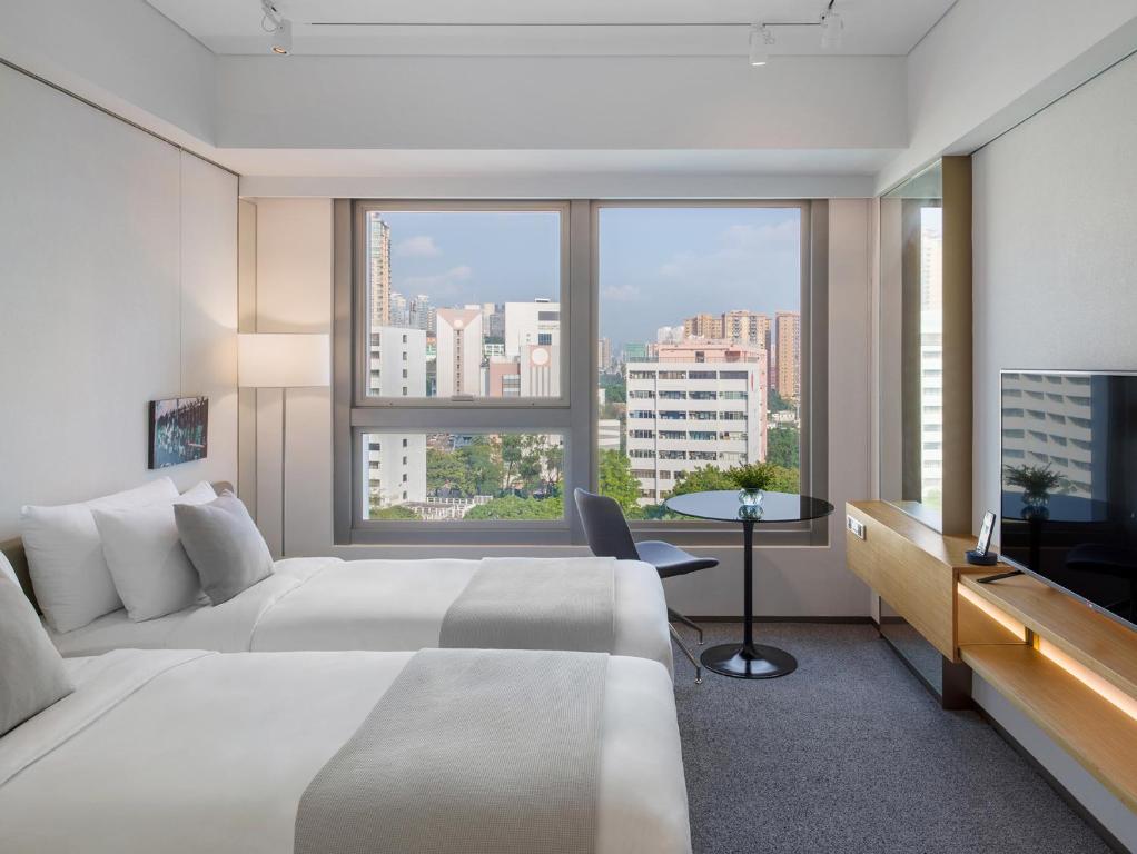 Двухместный (Двухместный номер Делюкс с 2 отдельными кроватями) отеля Hotel Stage, Гонконг (город)