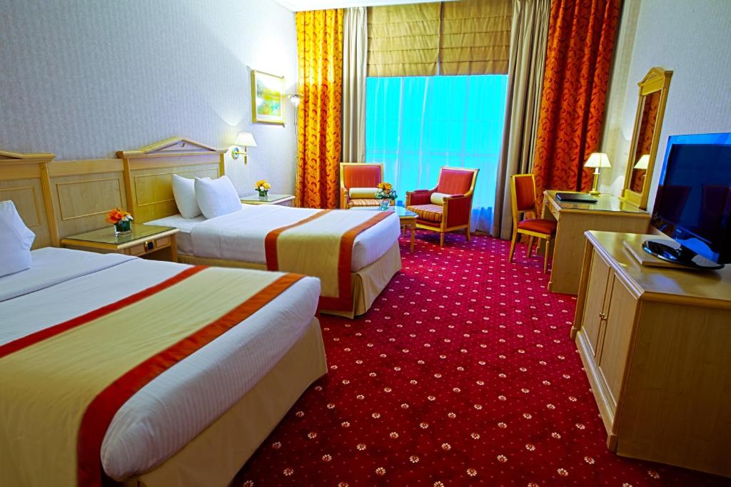 Двухместный (Представительский двухместный номер с 2 отдельными кроватями) отеля Capitol Hotel, Дубай