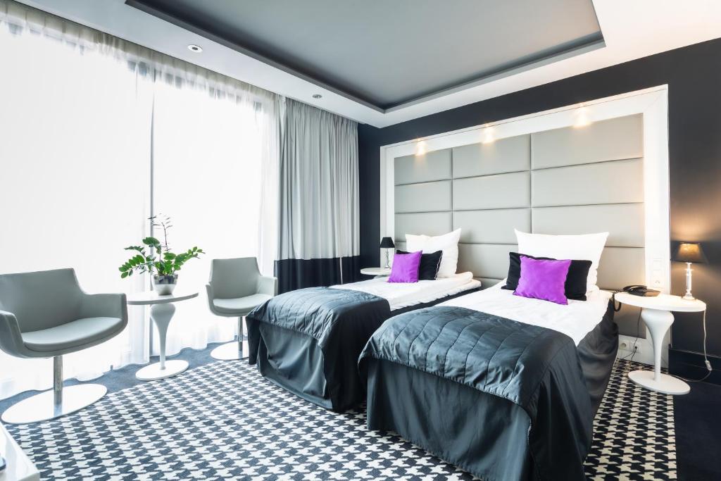 Двухместный (Представительский двухместный номер с 1 кроватью или 2 отдельными кроватями) отеля Piano Hotel Restaurant & Pub, Ополе