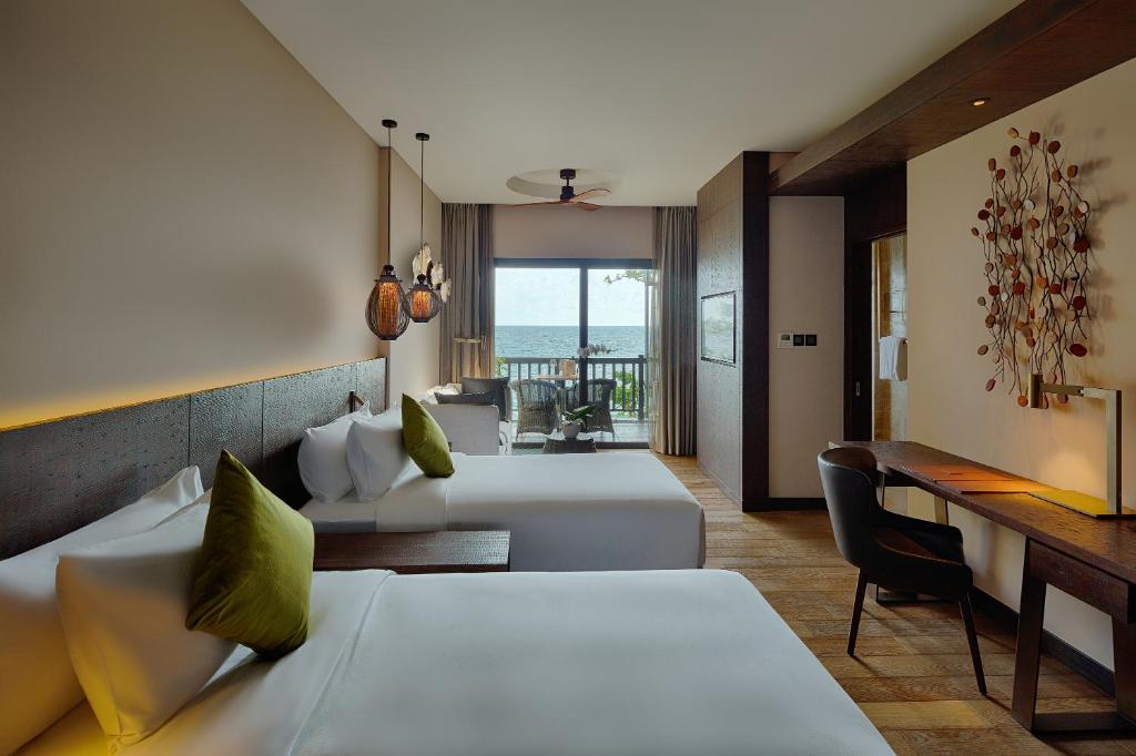 Двухместный (Deluxe Ocean Twin View with Balcony) курортного отеля Nam Nghi Phu Quoc Island, Дуонг-Донг