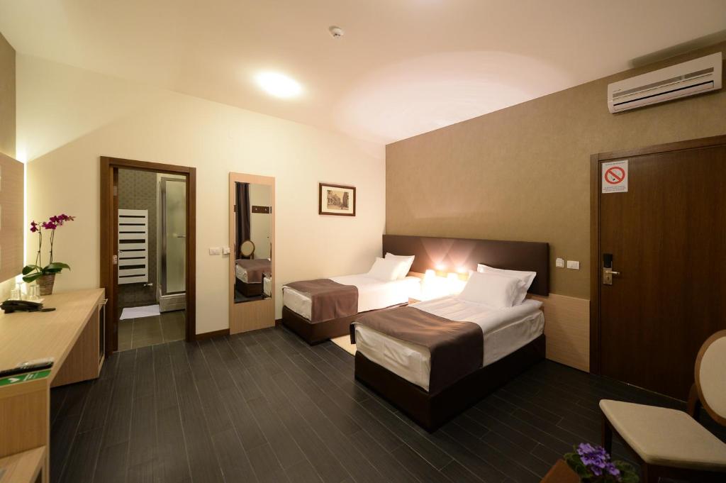 Двухместный (Стандартный двухместный номер с 2 отдельными кроватями) отеля Hotel Majdan, Белград