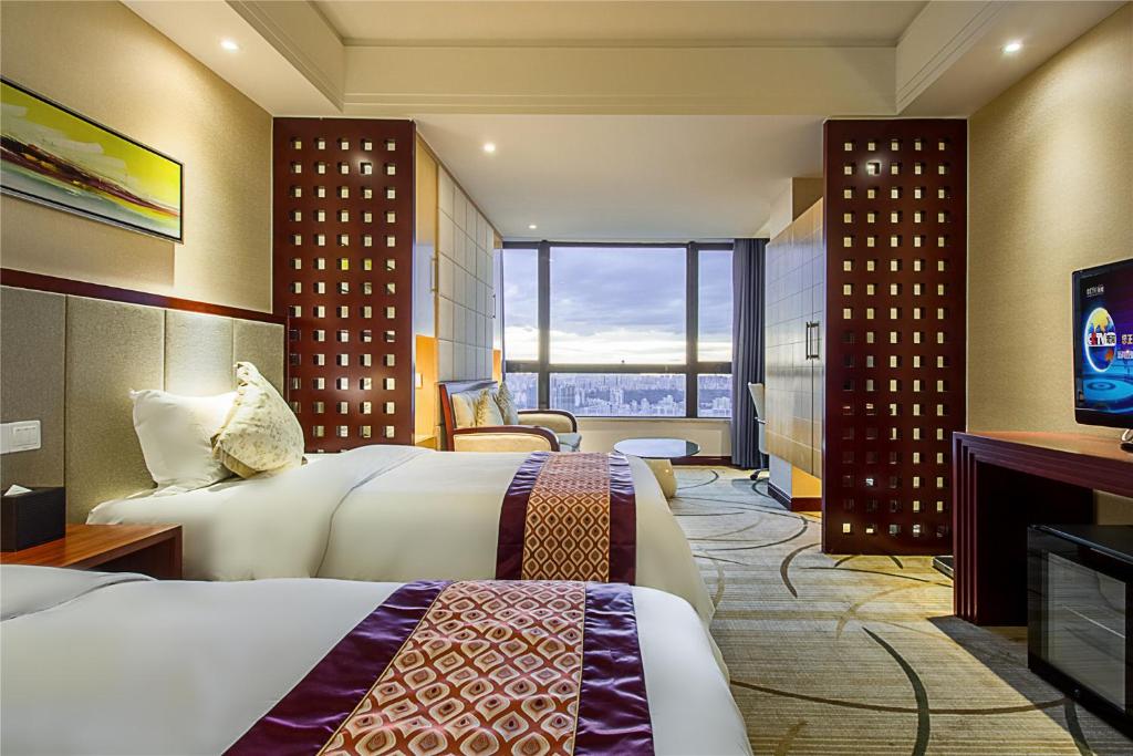 Двухместный (Улучшенный двухместный номер с 2 отдельными кроватями) отеля Ming Guang International Grand Hotel Haikou, Хайкоу