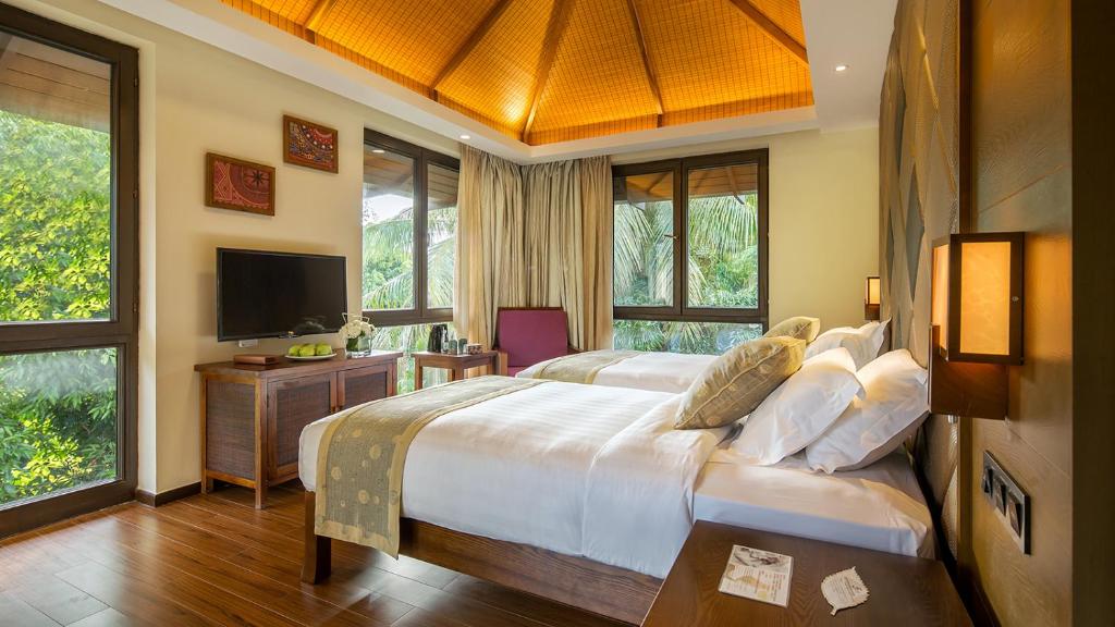 Вилла (Вилла Делюкс с 4 спальнями и собственным бассейном) отеля Yalong Bay Villas & Spa, Санья