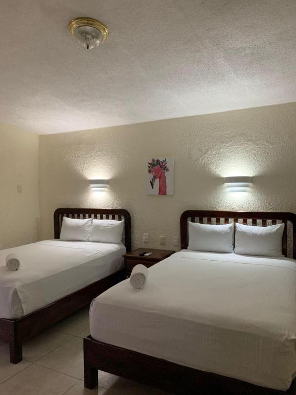 Двухместный (Двухместный номер с 2 отдельными кроватями) отеля Hotel Caribe, Косумель