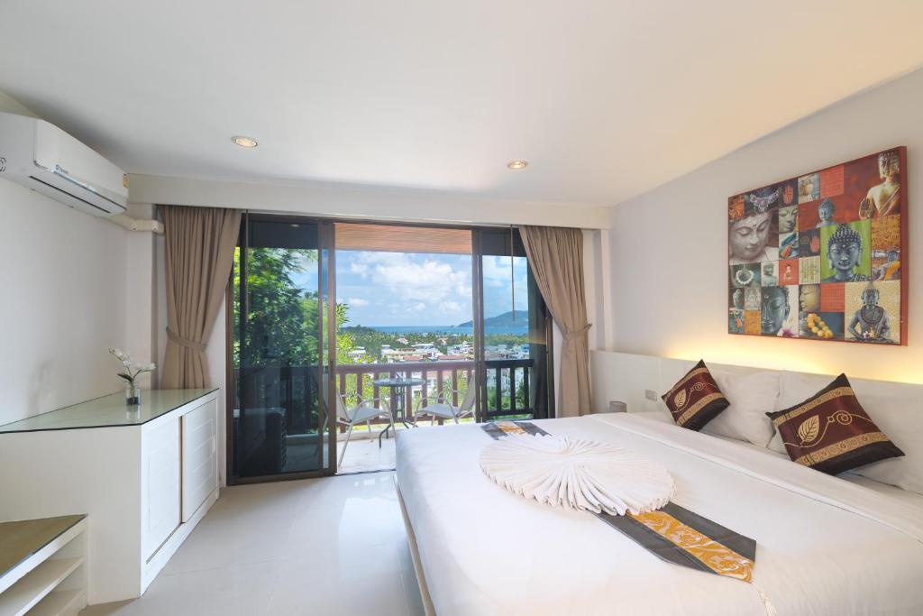 Двухместный (Двухместный номер Делюкс с 1 кроватью) курортного отеля Ocean View Phuket Hotel, Пхукет