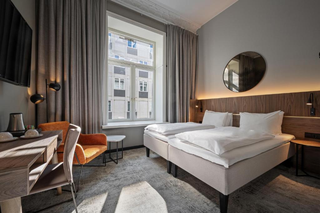 Двухместный (Стандартный двухместный номер с 2 отдельными кроватями) отеля Best Western Karl Johan Hotel, Осло