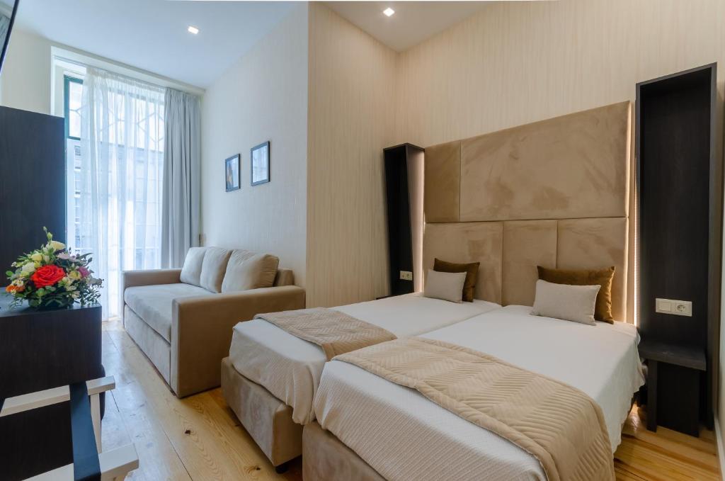 Двухместный (Улучшенный двухместный номер с 2 отдельными кроватями) отеля Hotel Duas Nações, Лиссабон