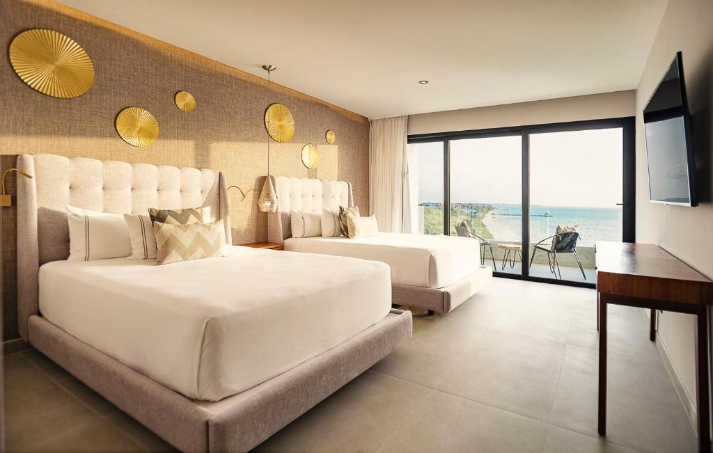 Двухместный (Двухместный номер с 2 отдельными кроватями) отеля The Fives Oceanfront, Пуэрто-Морелос