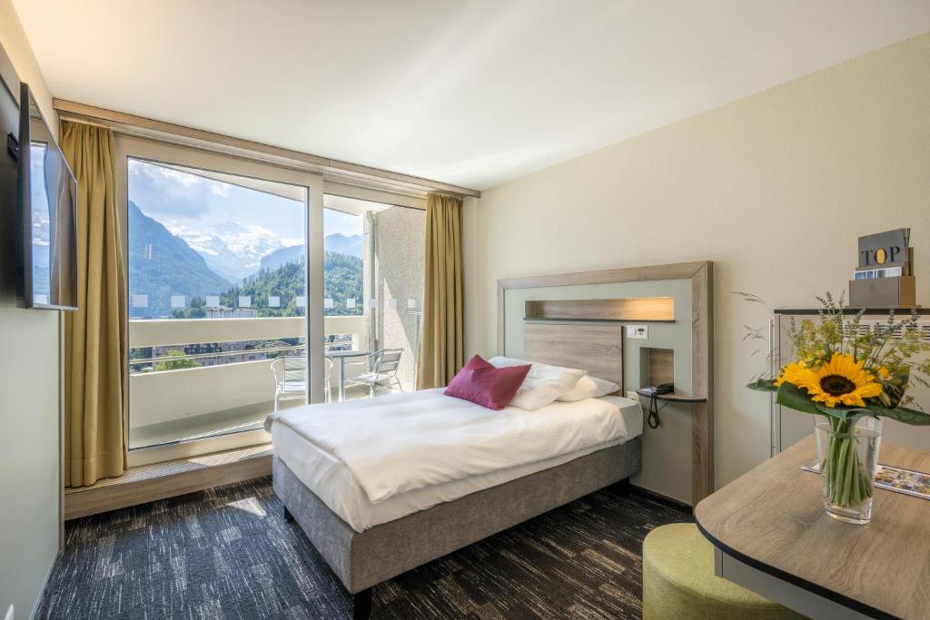 Одноместный (Одноместный номер Делюкс) отеля Metropole Swiss Quality Hotel, Интерлакен