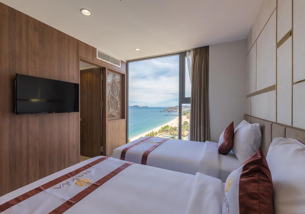 Двухместный (Двухместный номер Делюкс с 1 кроватью или 2 отдельными кроватями и видом на море) отеля MASOVA HOTEL, Нячанг