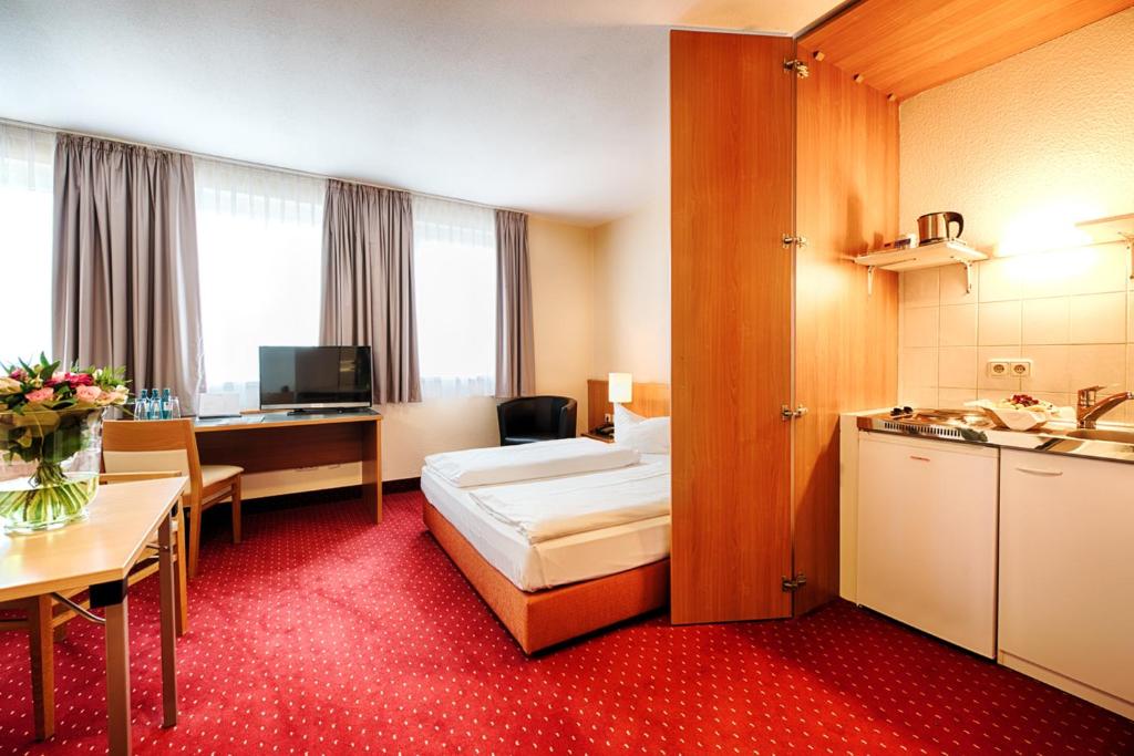 Двухместный (Улучшенный двухместный номер с 1 кроватью) отеля ACHAT Comfort Messe-Chemnitz, Хемниц