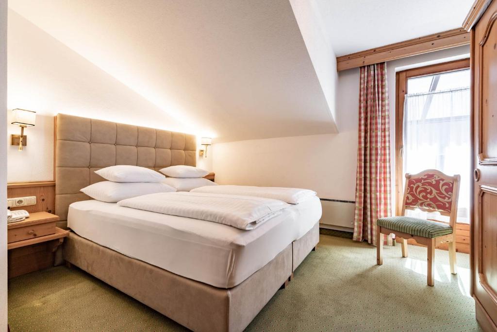 Сьюит (Двухуровневый люкс) отеля Hotel Berghof, Майрхофен