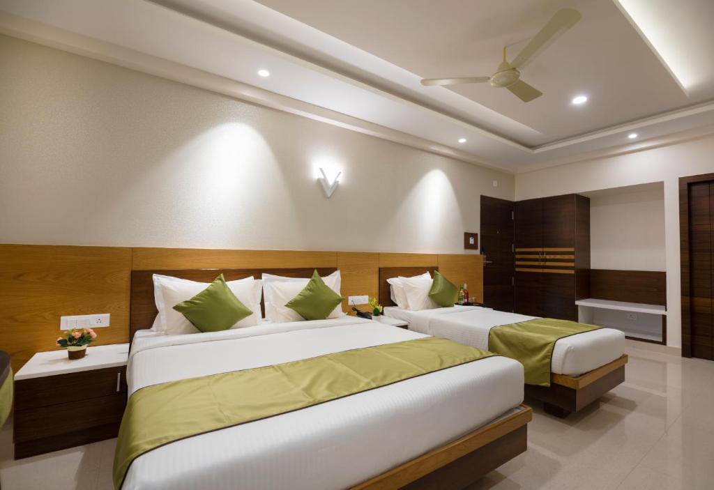 Двухместный (Двухместный номер Делюкс с 1 кроватью или 2 отдельными кроватями) отеля Vanusa Residency by Big Tree Hospitality, Бангалор
