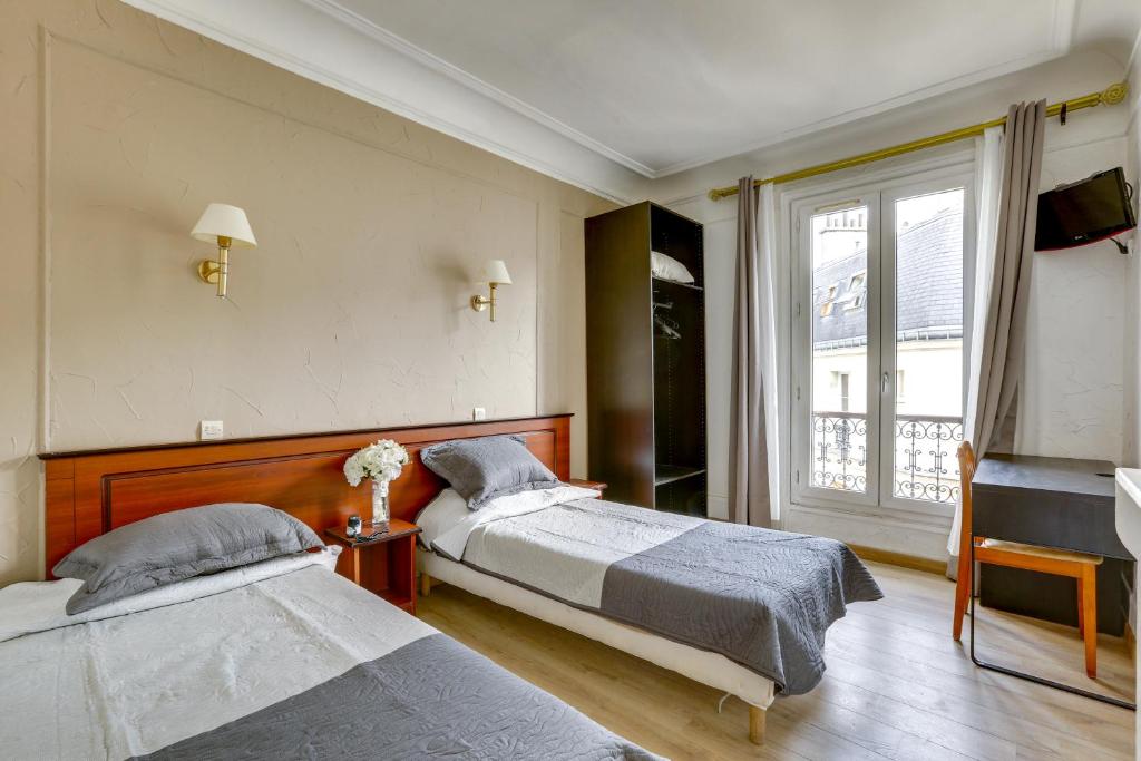 Двухместный (Двухместный номер с 2 отдельными кроватями) отеля Hôtel du Square d'Anvers, Париж