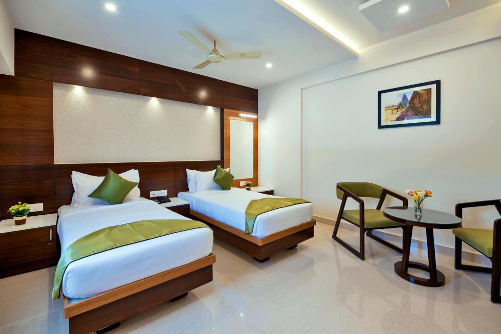 Двухместный (Двухместный номер с 2 отдельными кроватями) отеля Vanusa Residency by Big Tree Hospitality, Бангалор