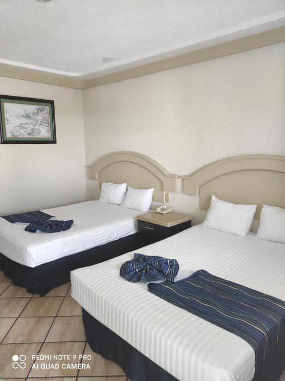Двухместный (Двухместный номер с 2 отдельными кроватями) отеля Hotel Playa Marina, Масатлан