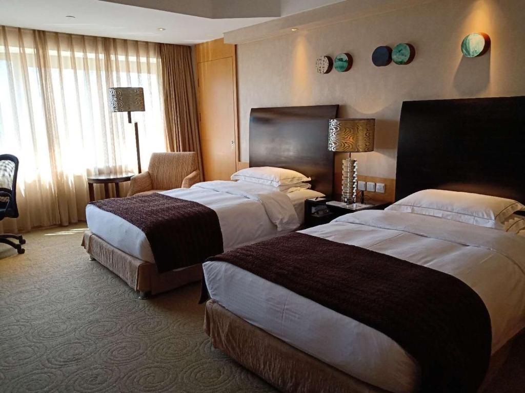 Двухместный (Двухместный номер Делюкс с 2 отдельными кроватями) отеля Marco Polo Parkside, Beijing, Пекин