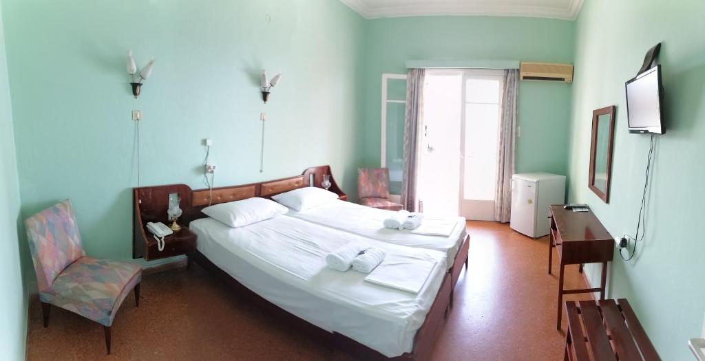 Двухместный (Двухместный номер с 2 отдельными кроватями и видом на море) отеля Nireus Hotel, Неа-Макри